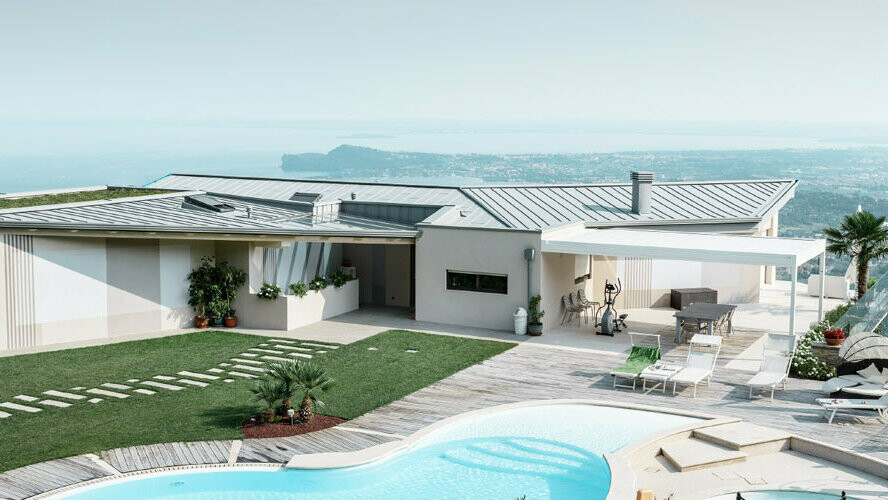 Bolighus med svømmebasseng og enestående beliggenhet. Det flate taket på den moderne bygningen er tekket med PREFALZ i patina grå.