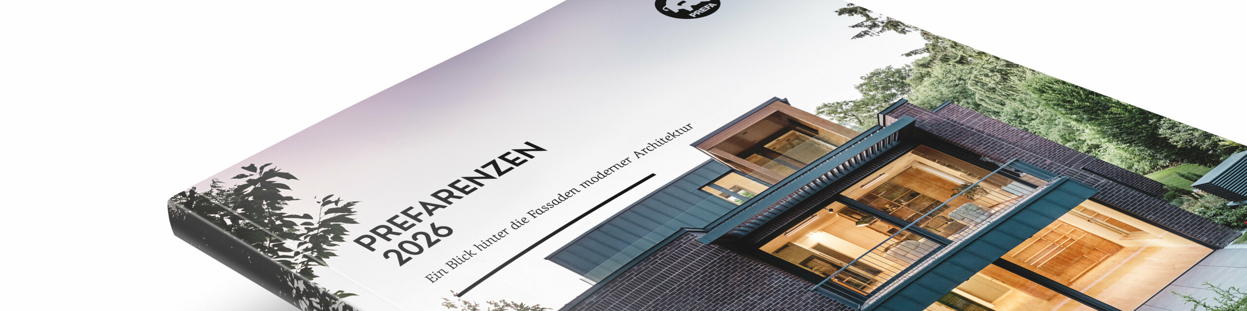 Bilde av Prefarenzen-boken i 2026-utgaven på hvit bakgrunn. Et av Prefarenzen-husene er avbildet på omslaget. 