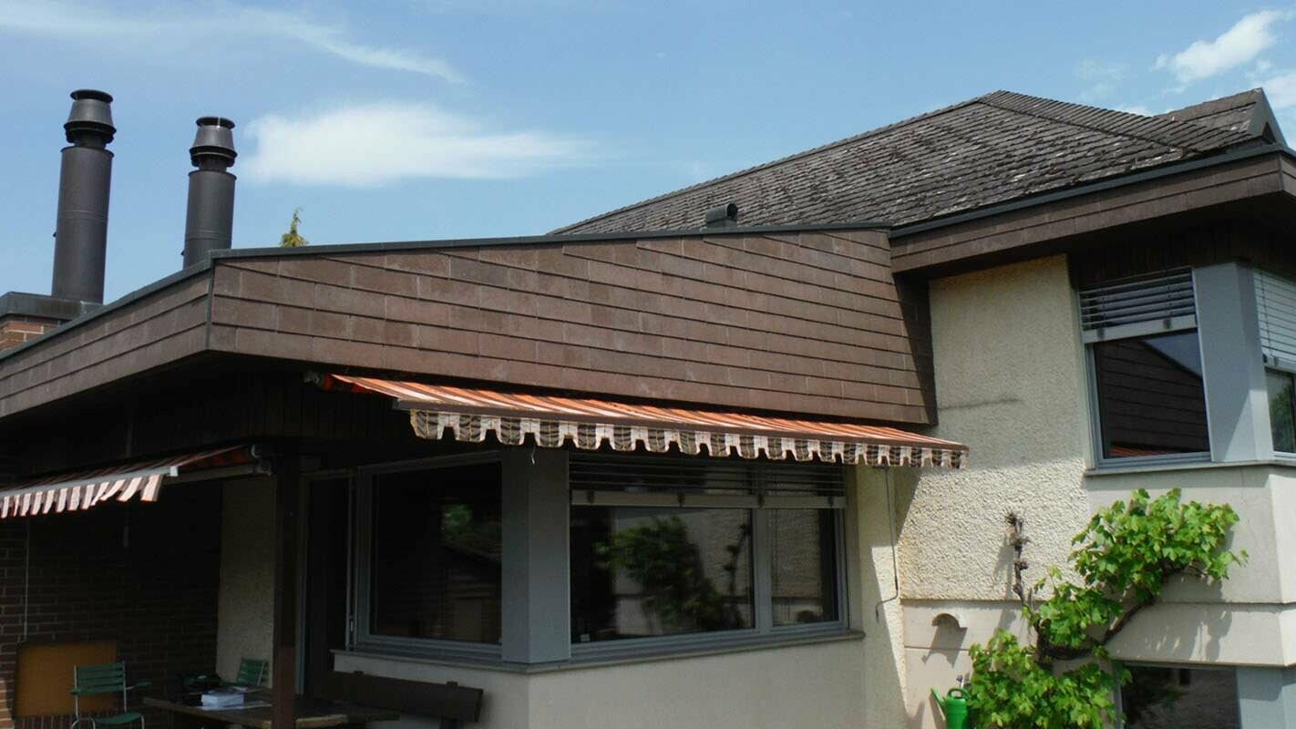 Enebolig med vinterhage og tilbygg etter renovering av taket med PREFA takplate